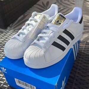 Adidas super star sneakers brand new never worn. 7